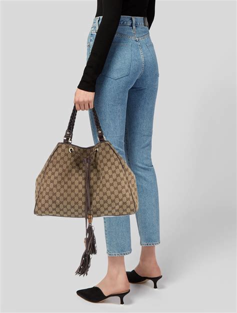 peggy gucci bag|Gucci GG Canvas Peggy .